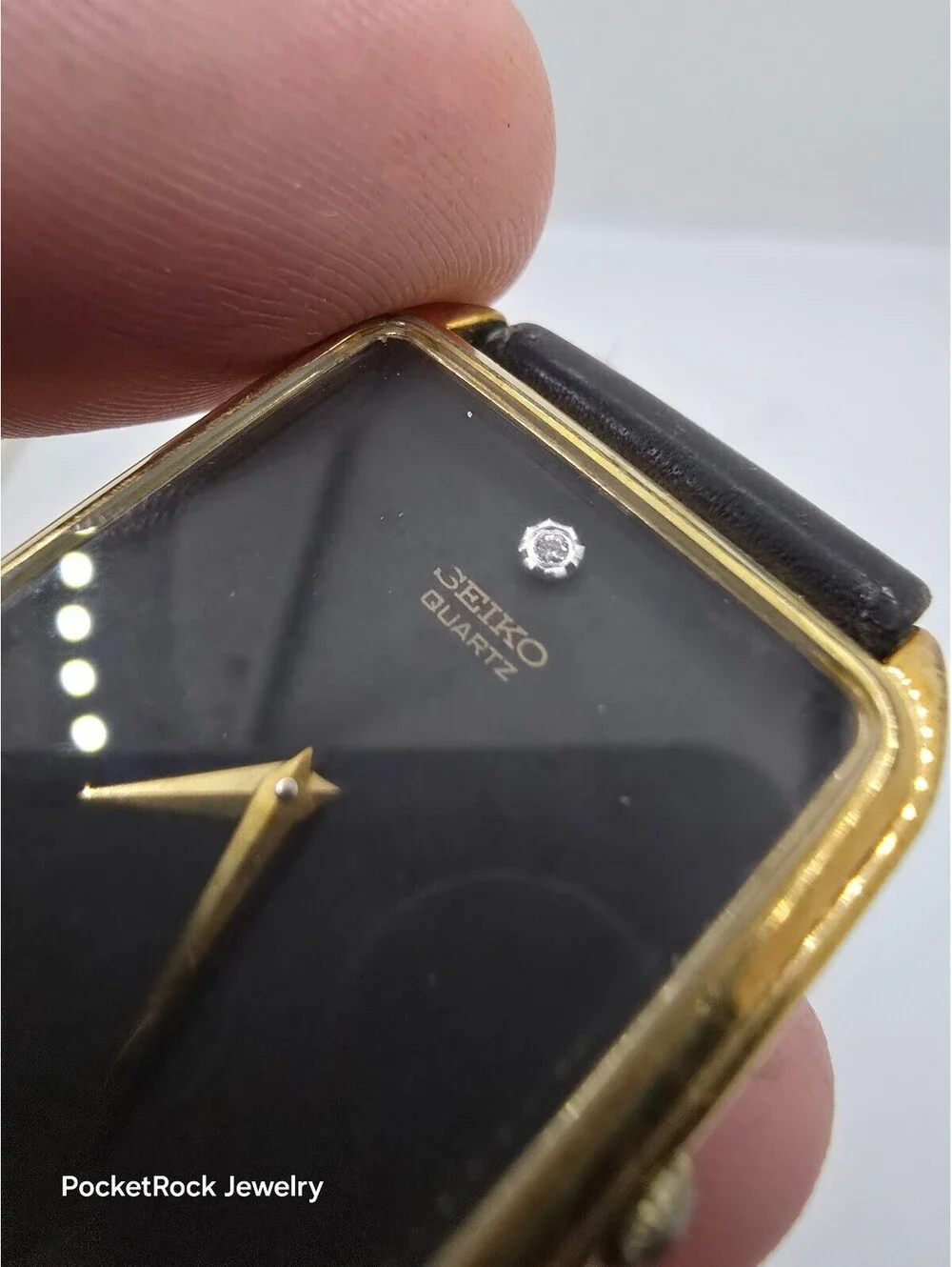 Seiko Quartz Rectangle Gold Tone Case Black Dial Black Leather Strap Watch